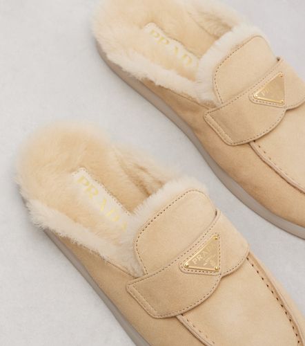 Prada Mules en daim et shearling - Prada - Modalova
