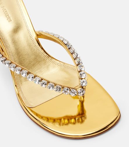 Mules Gigi en cuir à ornements - Amina Muaddi - Modalova