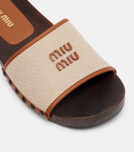 Miu Miu Mules à logo - Miu Miu - Modalova