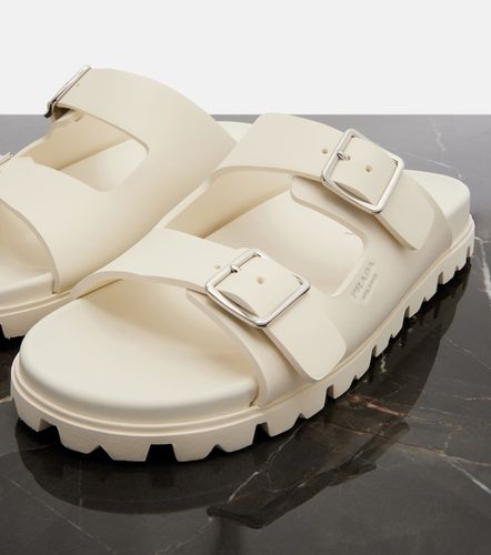 Prada Mules à logo - Prada - Modalova