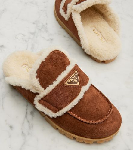 Prada Mules en daim et shearling - Prada - Modalova