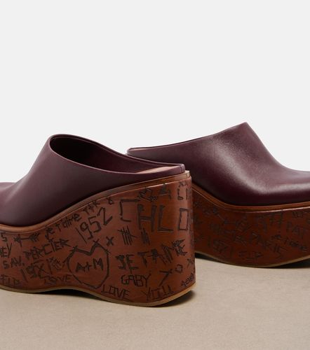Chloé Mules compensées Maxime en cuir - Chloe - Modalova