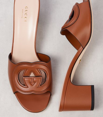 Gucci Mules Interlocking G en cuir - Gucci - Modalova