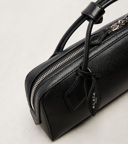 Alaïa Pochette Le Teckel Small en cuir - Alaia - Modalova