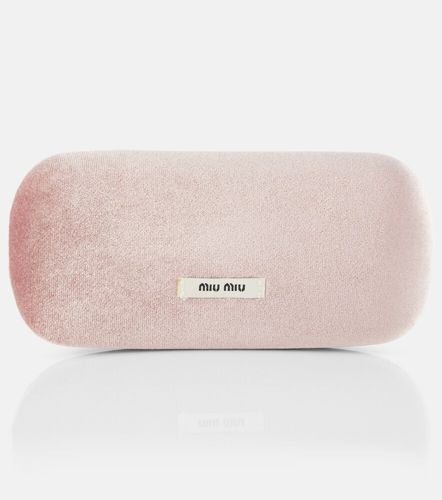 Miu Miu Lunettes ovales à logo - Miu Miu - Modalova