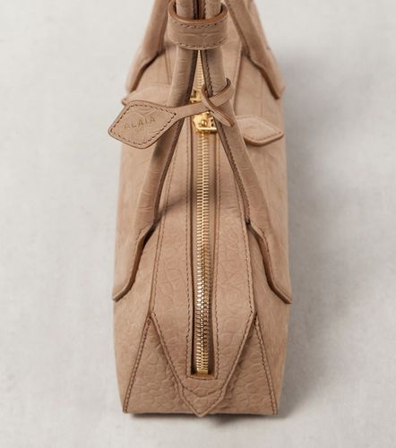 Alaïa Sac Le Teckel Small en cuir embossé - Alaia - Modalova