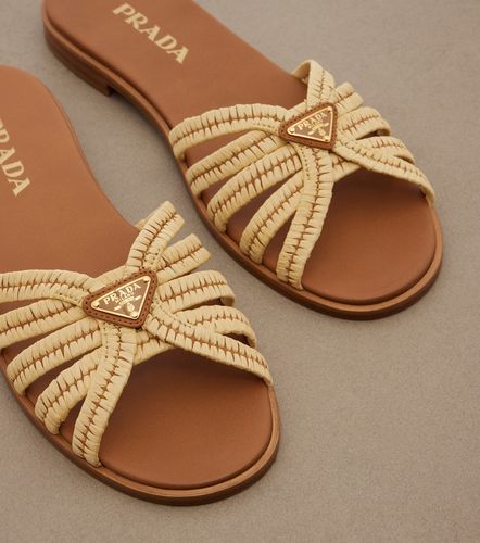 Prada Mules à effet raphia - Prada - Modalova