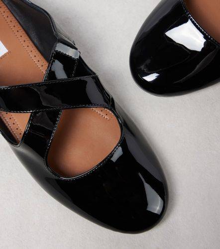 Alaïa Ballerines Criss Cross en cuir verni - Alaia - Modalova