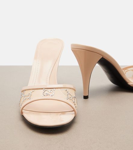 Mules Erin GG en cuir à ornements - Gucci - Modalova
