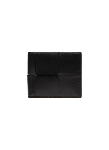 Oversize Intrecciato leather bifold wallet - BOTTEGA VENETA - Modalova