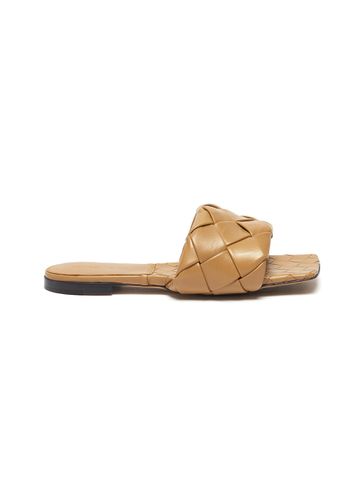 Lido' intrecciato leather flat sandals - BOTTEGA VENETA - Modalova