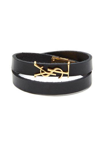 Logo charm leather loop bracelet - SAINT LAURENT - Modalova