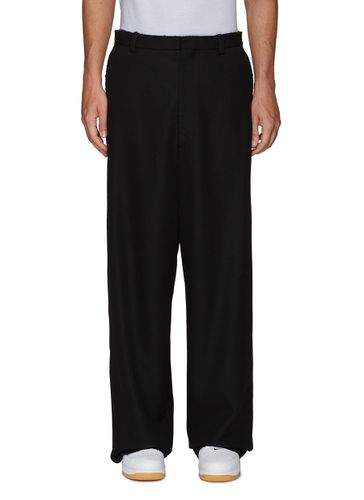 Worn Out Loose Fit Wool Pants - BALENCIAGA - Modalova