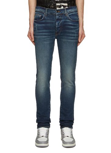 ‘Stack' Distressed Skinny Jeans - AMIRI - Modalova