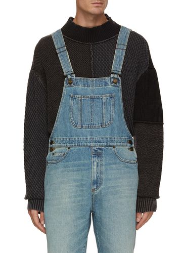 RAW HEM SHORT DENIM JUMPSUIT - SAINT LAURENT - Modalova