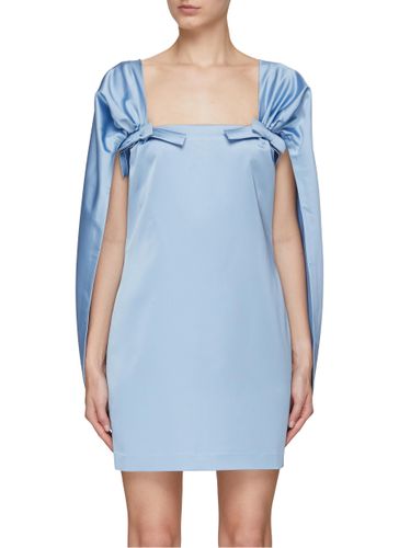 BOW APPLIQUÉ CINCHED BACK MINI DRESS - BERNADETTE - Modalova