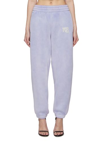 PUFF PAINT LOGO ESSENTIAL TERRY CLASSIC SWEATPANTS - T BY ALEXANDER WANG - Modalova