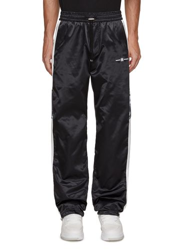 Hawaiian Print Side Stripe Track Pants - AMIRI - Modalova