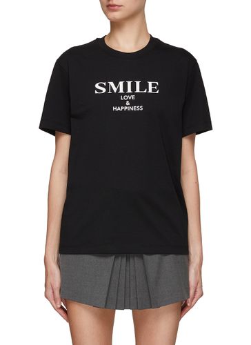 Smile Printed Short Sleeves T-Shirt - MO & CO. - Modalova
