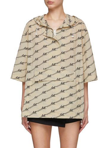 Monogram Short Sleeve Half Zip Jacket - MO & CO. - Modalova