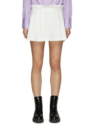 ‘The 98' Pleated Cotton Blend Mini Skirt - WE-AR 4 - Modalova