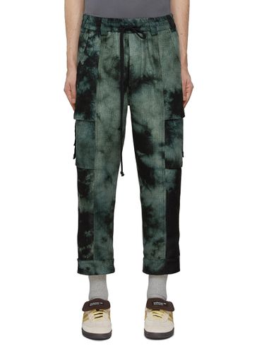 Tie Dyed Cropped Cargo Pants - SONG FOR THE MUTE - Modalova