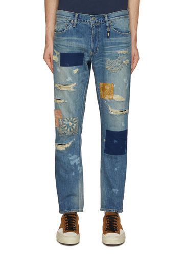 Patched Slim fit Jeans - FDMTL - Modalova