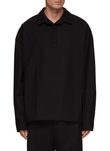Dennis Toggle Hem Oversized Long Sleeve Polo Shirt - THE FRANKIE SHOP - Modalova