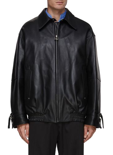 Oversized Buckled Sleeve Strap Leather Jacket - WOOYOUNGMI - Modalova