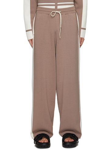 Straight Leg Contrasting Stripe Knit Pants - RE: BY MAISON SANS TITRE - Modalova