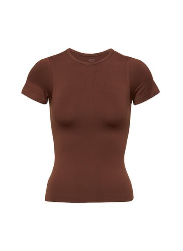 Soft Smoothing Seamless T-Shirt - SKIMS - Modalova