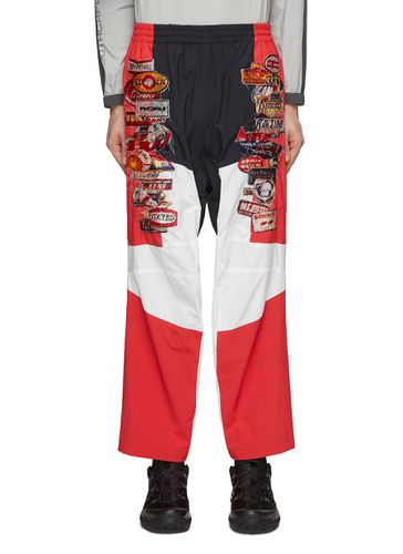 AI Racecar Embroidered Patch Track Pants - DOUBLET - Modalova