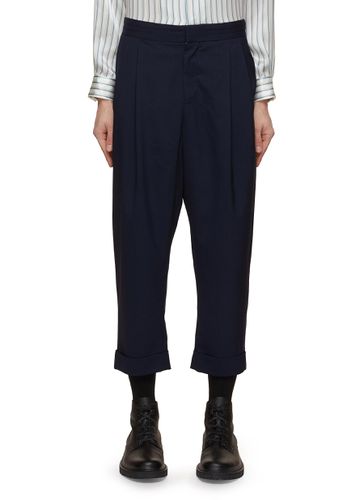 Double Pleated Tapered Cropped Wool Pants - RE: BY MAISON SANS TITRE - Modalova