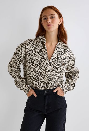 Blouse manches longues imprimée léopard en denim - MONOPRIX - Modalova