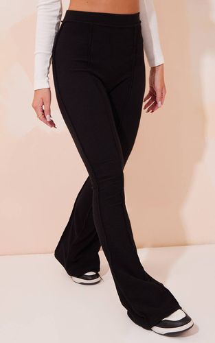 Black Pantalon Évasé Côtelé Taille Haute Avec Détails De Coutures | Taille 38 - PrettyLittleThing - Modalova