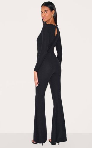 Black Combinaison Côtelée À Jambes Évasées Avec Manches Longues Et Finitions En Dentelle | Taille 42 - PrettyLittleThing - Modalova