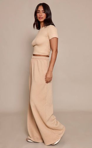 Jogging Ample Petite Taille Jambes Larges Effet Délavé | Taille 32 - PrettyLittleThing - Modalova