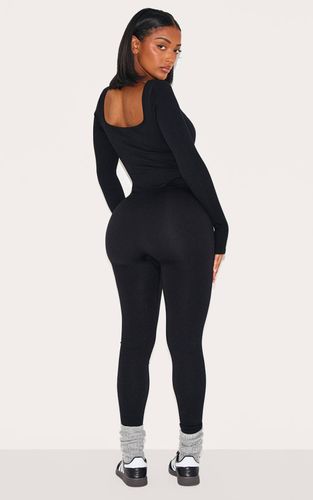 Black Combinaison Moulante Côtelée À Encolure Carrée Et Passants Pour Pouces | Taille XS - PrettyLittleThing - Modalova