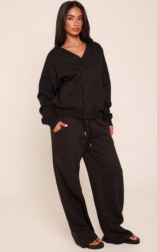 Black Jogging Petite Taille À Jambes Larges Avec Taille Élastiquée Et Cordon De Serrage | Taille XS - PrettyLittleThing - Modalova