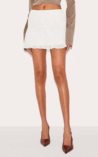 Cream Jupe Mini À Ourlet À Volants | Taille 42 - PrettyLittleThing - Modalova