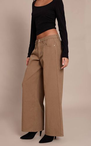 Olive Jean Boyfriend Taille Basse À Jambe Large | Taille 42 - PrettyLittleThing - Modalova