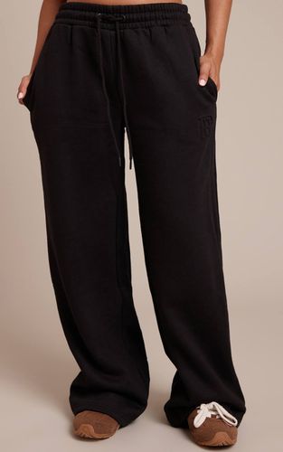 Black Jogging Petite Taille À Taille Coulissée Et Jambes Larges | Taille Large - PrettyLittleThing - Modalova