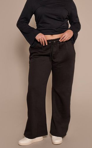 Black Jogging Grande Taille À Jambes Larges | Taille XL - PrettyLittleThing - Modalova