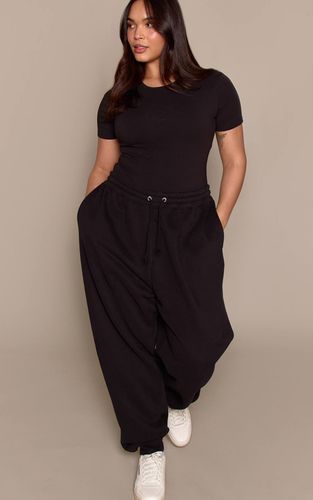 Black Jogging Grande Taille Avec Logo Embossé | Taille XL - PrettyLittleThing - Modalova