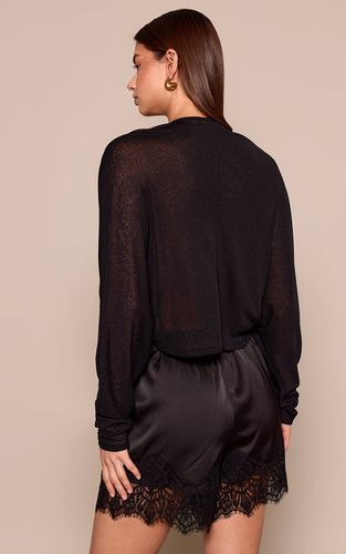 Black Top Manches Longues Slouchy En Mesh Dévoré Marron Avec Torsade Devant | Taille 34 - PrettyLittleThing - Modalova