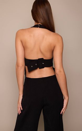 Black Combinaison Jambes Larges Col Licou Avec Détail Boucle | Taille 42 - PrettyLittleThing - Modalova