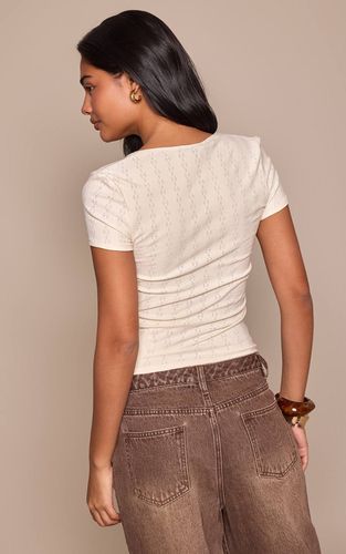 Cream T-shirt À Manches Courtes Avec Détail Col V En Maille Pointelle | Taille 32 - PrettyLittleThing - Modalova