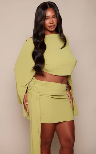 Olive Mini Jupe Co-ord Tissée Fluide Avec Nœud Sur Le Côté Plus | Taille 46 - PrettyLittleThing - Modalova