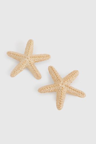 Boucles d'oreilles puces en forme d'étoile de mer - boohoo - Modalova