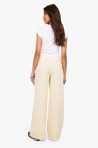 Pantalon taille basse à jambes larges | Taille 44 - boohoo - Modalova